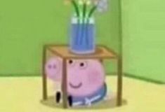 pep the pig is sitting in front of a vase with flowers