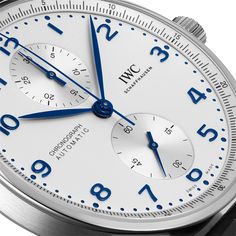 The harmoniously designed chronograph with its peripheral precision scale and recessed totalizers has been the most coveted member of the Portugieser family since 1998. Iwc Watches, Visa Card, Gold Case, White Dial, Watch Collection, Stainless Steel Case, Chronograph