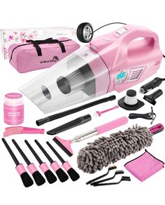 the pink vacuum is packed with cleaning supplies