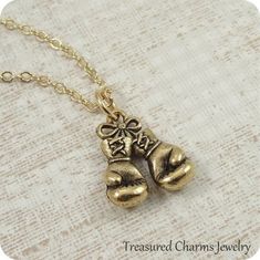 Boxing Gloves Necklace, Gold Boxing Gloves Charm on a Gold Cable Chain Adjustable Box Chain Charm Necklace For Gift, Gold Charm Necklaces With Box Chain For Gifts, Gold Charm Necklace With Box Chain For Gifts, Gold Charm Necklace With Box Chain As Gift, Brass Charm Necklace With Box Chain For Gift, Brass Charm Necklace With Box Chain As Gift, Sports Packaging, Gold Boxing Gloves, Dog Bones