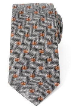 Small, bright pumpkins neatly punctuate a tie made with silk and linen in a herringbone weave that smartens any holiday look. 3" width; 59" length 50% silk, 30% cotton, 20% linen Dry clean Imported Classic Fall Ties For Formal Occasions, Classic Ties For Formal Occasions In Fall, Classic Formal Ties For Fall, Classic Fall Formal Ties, Formal Fall Standard Tie Accessories, Formal Fall Standard Tie Suit Accessories, Formal Fall Suit And Tie Accessories Standard Tie, White Herringbone, Tie Design