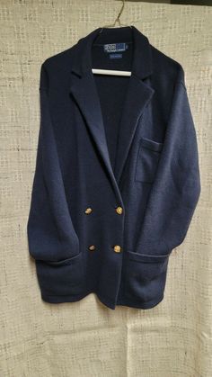 Nice vintage jacket. In gently used overall excellent condition. Timeless design.  Size 40, fits closely like a men's xl. Navy blue. Please use photos for further description. Any questions please ask. Thank you for looking. Designer Formal Sweater For Fall, Vintage Sweater For Workwear, Vintage Long Sleeve Sweater For Work, Classic Knit Sweater Coat For Work, Designer Winter Formal Cardigan, Vintage Winter Workwear Cardigan, Vintage Long Sleeve Cardigan For Work, Vintage Fall Sweater For Work, Vintage Button Closure Cardigan For Work