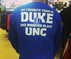 the back of a man wearing a blue shirt that says, my favorite team is duke and whoever plays unc