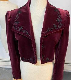 This is the last jacket we have in this style, size or color. Photos lightened to augment details. Gallery photo best illustrates true color. EXCELLENT VINTAGE CONDITION, DRY CLEANED Downtown Jacket (No. 534017). The downtown, insouciant state of mind. Creates a cheerful stir. Soutache braid vining down the lapels, around the front and at the cuffs. Sleeves and hem are slightly rounded. Can't feel bad in this. Can't look bad, either. Cotton velvet with a lovely sheen, 100% acetate satin lining. Downtown Jacket, J Peterman, Vintage Vest, Burgundy Wine, Velvet Jacket, Gallery Photo, Embroidered Jacket, Cotton Velvet, Crop Jacket