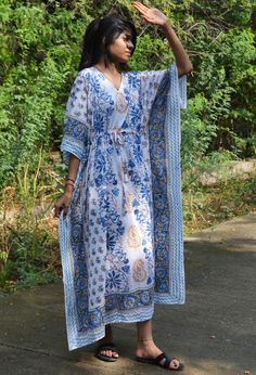 This Beautiful Hand Block Print Caftan or can be called as Tunic is made with super fine quality cotton and designs have been crafted by Hand Prints. Usage - Tunic, Gown, Maxi, Bikini Cover up, Beach Wear, Caftan, Bathrobe Caftan, Swim Wear, Party Caftan Fabric - 100% Cotton Color - White Pattern - Floral Print Size - Plus Size, can fit Upto 4XL Bust/chest size - Free Size ( Drawstring ) Long Caftan- 46" Inches (Approx.) * It has Adjustable Drawstring Waist. * V Shape Neck Which is 8" Inches Dee Long Blue Cotton Kaftan, Cotton Maxi Sleep Dress, Blue Bohemian Sleepwear For Home, Blue Bohemian Cotton Robe, Blue Cotton Kaftan For Loungewear, Blue Cotton Long Sleeve Kaftan, Long Cotton Home Dress, Blue Cotton Maxi Dress For Loungewear, Blue Cotton Free Size Maxi Dress