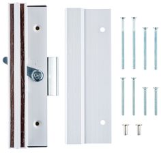 an image of a door handle with screws and bolts