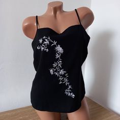 2000s Сrop tops for women     Vintage blouses Y2K  Top with straps with Embroidery Floral  Women blouse Retro Clothing Clothes Party  festival Boho Flowers M Polyester 100%    Color  Black white       Measurement: Bust 37 inches / 94cm Waist 33 inches / 84cm Length 21 inches / 53cm Casual Party Camisole Top, Casual Camisole Top For Party, Summer Party Cotton Camisole, Casual Embroidered Camisole Tank Top, Fitted Embroidered Cami Top, Y2k Summer V-neck Top, Summer Y2k V-neck Camisole, Embroidered Camisole Tops For Spring, Spring Embroidered Camisole Top