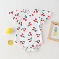 This beautiful baby girl onesie is made with a cherry print pattern mesh patchwork design and a round-collar, short-sleeved look perfect for summer. Soft, airy fabric is lightweight and comfortable, ensuring all-day comfort and breathability. COLOR White, Red GENDER Baby Girl MATERIAL Cotton PATTERN Fruit (Vegetable), Patchwork SEASON Summer SIZE (AGE) 66 (3-6M), 73 (6-9M), 80 (9-12M), 90 (12-24M) Pattern Fruit, Girl Material, Short Sleeve Summer Dresses, Summer Soft, Cherry Print, Baby Body, Patchwork Designs