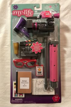 an assortment of items in a package on a bed