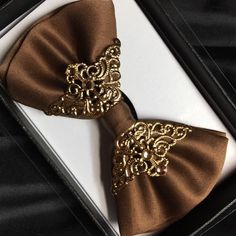 Excited to share this item from my #etsy shop: Golden Brown bow tie Elegant Bow With Butterfly Knot For Black-tie Events, Elegant Formal Bow With Butterfly Knot, Gold Bow Tie For Party, Gold Elegant Bow With Tie Back, Elegant Gold Tie With Decorative Bow, Gold Satin Bow Tie, Gold Party Bow, Gold Satin Bow Tie For Black-tie Events, Gold Bow With Bow Tie Back For Party