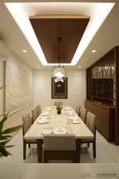 the dining room is clean and ready for us to eat dinner on it's long table