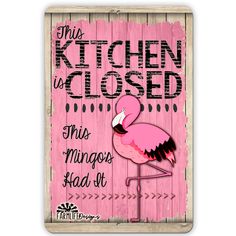 this kitchen is closed pink flamingo sign with black lettering on the front and bottom