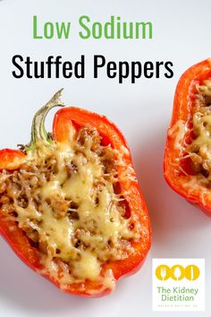 two stuffed peppers on a white plate with the words low sodomm stuffed peppers