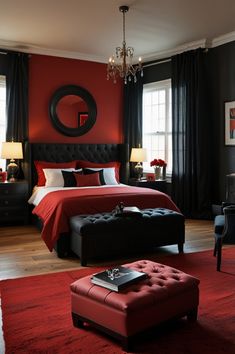 a red and black bedroom with a chandelier hanging from the ceiling, an ottoman in front of a bed