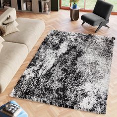 a black and white rug in a living room