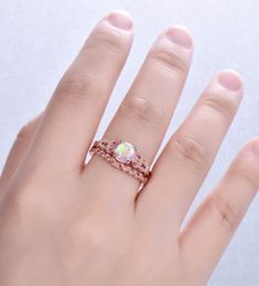 Opal Ring, Pink Opal Wedding Ring Set, Opal Ruby Engagement Ring, Dainty Ruby Stacking Matching Band, Vintage Bridal Set, Rose Gold Rings Unique wedding set,perfect as engagement/wedding ring, birthday or anniversary gift, etc. Engagement Ring ❀gemstone is 7mm round cut lab-created pink fire opal❀ ❀band stone is lab created ruby❀ ❀925 Sterling Silver,Rose/White/Yellow Gold Plated❀ ❀14/18k Solid White/Rose/Yellow gold❀ Wedding Band ❀Lab created ruby❀ ❀925 Sterling Silver,Rose/White/Yellow Gold Pl Opal Wedding Set, Opal Wedding Ring Set, Unique Wedding Sets, Unique Opal Ring, Opal Wedding Ring, Engagement Ring Dainty, Rose Gold Opal Ring, Rose Gold Rings, Pink Fire