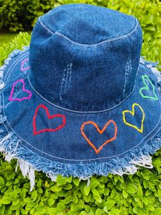 Amazing distressed denim hand embroidered rainbow hearts bucket hat All the rage for this summer! Must have item Trendy Bucket Hats For Spring, Trendy Cotton Hat For Festivals, Trendy Distressed Summer Hat, Distressed Wide Brim Summer Hat, Casual Festival Bucket Hat One Size, Distressed Wide Brim Hat For Summer, Trendy Handmade Cotton Bucket Hat, Trendy Cotton Sun Hat For Festivals, Playful Bucket Hat For Spring Festival