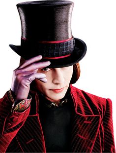 a woman wearing a top hat and red jacket