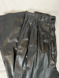 Vintage Women's Leather Pants/Trouser - 1980s Brand: Vakko Size: 10 Color: Black Detail: Soft leather pants, with pleated pockets Retro Black Bottoms For Night Out, Wide Leg Leather Pants With Pockets For Party, Bottoms With Pockets For Evening In Fall, Evening Bottoms With Pockets For Fall, Retro Pleated Bottoms For Fall, Fall Pleated Bottoms For Night Out, Pleated Bottoms For Night Out In Fall, Vintage Pleated Bottoms For Fall, Retro Pleated Workwear Bottoms