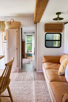 a living room with a couch and table in it