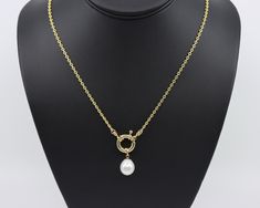 "Ultra modern thick gold filled chain handcrafted with marine sailor's clasp and fine teardrop shaped pearl pendant. This gold filled chain link necklace features a semi-round medium weight 2.7mm long and short link 14k gold filled chain paired with a 12x17mm pearl drop pendant suspended from a sailor's clasp. This necklace is an ultra-modern minimalistic look that can be paired with your other fine jewelry for a flattering look.  The links are machined to perfection, making for a clean and cons Gift Yellow Gold Pearl Necklace With Chain, Yellow Gold Pearl Necklace Chain As Gift, Yellow Gold Oval Pearl Chain Jewelry, Oval Yellow Gold Pearl Chain Jewelry, Pearl Drop Pendant, Detailed Jewelry, Chain Extenders, Chains Necklaces, Ultra Modern