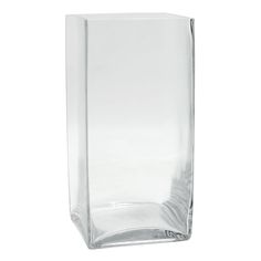 a clear glass vase is shown against a white background, with the bottom half empty