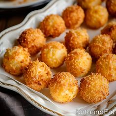 some fried food is on a white plate