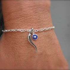 Italian horn and evil eye bracelet sterling silver italian | Etsy Spiritual Sterling Silver Evil Eye Bracelet, Italian Horn Necklace, Evil Eye Tattoo, Italian Horn, Hamsa Bracelet, Gold Hamsa, Horn Necklace, Horn Pendant, Italian Jewelry