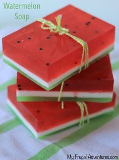 three watermelon soaps tied with twine and sitting on top of each other