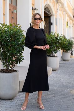 Round neckline Puff sleeves Short sleeves Backless Zipper on back Button detailed Tie detailed Midi length Dress length: 126cm/ 49.60 in Skirt length: 92 cm/ 36.22 in Sleeve length: 55 cm/ 21.65 in Fall Evening Midi Dress With Blouson Sleeves, Evening Midi Dress With Blouson Sleeves For Fall, Evening Puff Sleeve Dress With Structured Shoulders, Evening Puff Sleeve Dress With Elastic Sleeves, Formal Midi Dress With Puff Sleeve And Structured Shoulders, Formal Midi Dress With Structured Puff Sleeves, Elegant Midi Dress With Lantern Sleeves For Night Out, Elegant Lantern Sleeve Midi Dress For Night Out, Evening Midi Dress With Lantern Sleeves