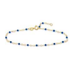 Distinctive blue enamel beads embellish shimmering links around the length of this stylish women's bracelet. Fashioned in 14K yellow gold, the 7.5-inch cable chain secures in place with a spring ring clasp. Dainty Blue Beaded Chain Bracelet, Blue 14k Gold Cable Chain Jewelry, Elegant Blue Bracelet With Delicate Chain, Elegant Blue Bracelets With Delicate Chain, Blue Beaded Chain Bracelets, Pnina Tornai, Jared The Galleria Of Jewelry, Enamel Beads, Bracelet Blue