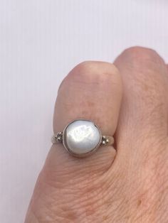 Vintage pearl pinky ring. 925 sterling silver  set with a huge white free form Pearl set in very detailed vintage filigree  Does not tarnish  Size 4 My jeweler can re size for a $20 fee All rings are shipped free in the US in a nice gift box.   Check out our over a THOUSAND great reviews Engraving is $4 per letter and is not always perfect depending on the piece. It can take a few days if the jeweler is busy. This is payable to Paypal Judithsltd@gmail.com Unique Pearl Drop Jewelry, Unique Pearl Jewelry For Anniversary, White Sterling Silver Pearl Ring, White Pearl Sterling Silver Ring, Fine Jewelry Sterling Silver Pearl Ring With Oval Shape, Oval Sterling Silver Pearl Ring In Fine Jewelry Style, Fine Jewelry Oval Pearl Ring In Sterling Silver, Oval Sterling Silver Pearl Ring, Silver Pearl Ring With Cabochon