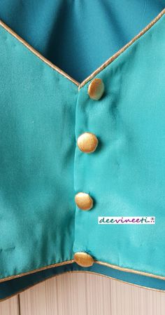 This Made to Order/Made to Measurement/Custom Made Indian Ethnic Blouse. - Fabric - Crepe - Color - Turquoise Blue - Princess Cut - Padded - V Neck - Back Hook Closure - Golden Piping all over and Golden Buttons at back - Sleeveless Fabric Care : Dry Clean Only Disclaimer: The actual color of the product might slightly differ from the image due to photographic lighting or monitor's display Shipping: This is made to order product. Once you place the order we will provide you with a template for m Fitted Green Choli Straight Kurta, Traditional Turquoise Dresses For Diwali, Fitted Turquoise Traditional Wear For Festive Occasions, Festive Turquoise Kurta For Navratri, Traditional Turquoise Dress For Diwali, Turquoise Dresses For Diwali, Fitted Turquoise Anarkali Choli, Turquoise Anarkali Fitted Lehenga, Turquoise Traditional Fitted Dress