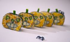 several pieces of food are arranged in the shape of pumpkins