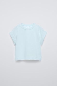 CUFFED SLEEVE T-SHIRT - Blue / Green | ZARA United States Trendy Relaxed Fit T-shirt With Cap Sleeves, Summer T-shirt With Ribbed Neckline, Solid Tops With Ribbed Neckline And Short Sleeves, Trendy Summer Tops With Cuffed Sleeves, Trendy Short Sleeve Shirt With Rolled Sleeves, Basic Short Sleeve Top With Ribbed Neckline For Spring, Spring Basic Short Sleeve Top With Ribbed Neckline, Spring Cotton Cap Sleeve Top, Spring Cotton Top With Cap Sleeves