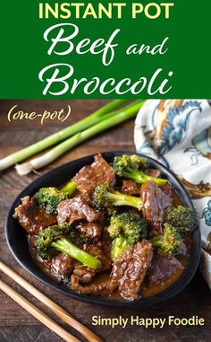 beef and broccoli stir fry on a plate with chopsticks next to it