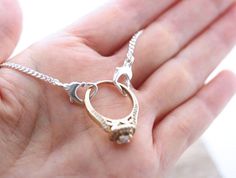 "This gorgeous heart ring holder pendant necklace no only holds your ring securely but also looks lovely as a piece of jewelery. You can wear it to any event and those around you will notice that pretty pendant! . Big collection Ring Holder.: http://etsy.me/1sJXoCf Cast using 100% sterling silver, no pewter, nickel or lead was used to create this piece, buy with peace of mind. ツ . Need initials, birthstones, charms?.... http://etsy.me/10D9H8j FEATURE: . Solid Sterling Silver Heart ring holder 13 Wedding Ring Necklace Holder, Necklace Ring Holder, Jewelry History, Ring Holder Pendant, Traditional Wedding Rings, Wedding Ring Holder, Ring Holder Necklace, Precious Rings, Ring Holder Wedding