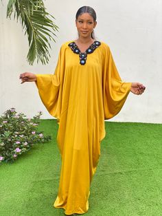 Beautiful mustard yellow Kaftan. Perfect for a special occasion or casually worn on warm evenings. Festive Floor-length Yellow Kaftan, Gold Floor-length Maxi Dress For Eid, Gold Long Sleeve Dress With Dabka Detailing, Gold Maxi Length Abaya For Party, Gold Maxi Dress For Eid, Gold Kaftan With Dabka Detailing, Elegant Yellow Kaftan For Eid, Floor-length Yellow Dresses For Eid, Yellow Floor-length Dresses For Eid