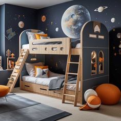 a child's bedroom with bunk beds and space themed wallpaper