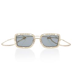 Electic eyewear, such as these golden sunglasses, is a Gucci signature. This pair is designed with chainlink-motif frames, gray lenses, and a removable chain eyewear retainer. | Gucci Chainlink rectangular sunglasses Golden Sunglasses, Gray Lenses, Buy Gucci, Rectangular Sunglasses, Gucci Sunglasses, Gucci Accessories, Gold Sunglasses, Grey Lenses, Chain Link