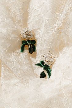 The perfect holiday accessory! Introducing our stunning Velvet Bow and Pearl Drop Earrings. Featuring a cluster of lustrous pearls at the stud, an emerald velvet bow, and a dangling teardrop crystal, these lightweight earrings are the perfect combination of classic and playful. Post with bullet clutch back for easy and secure wear. Emerald Velvet, Fairytale Party, Ribbon Earrings, Earrings Emerald, Green Accessories, White Dress Party, Shoe Gifts, Lightweight Earrings, Velvet Bow