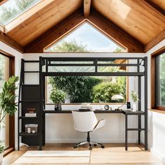 a loft bed sitting under a window next to a white desk and chair in a room