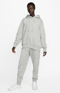 Exaggerated features like an oversized kangaroo pocket and extra tall ribbing add to the roomy feel of this sporty hoodie with a cozy brushed fleece interior. Drawstring hood 80% cotton, 20% polyester Machine wash, dry flat Imported French Terry Hoodie With Pockets, Hooded Sweats With Side Pockets For Fall, French Terry Hoodie With Kangaroo Pocket For Loungewear, Relaxed Fit Hooded Cozy Sweats, Cozy Hooded Sweats With Relaxed Fit, Cozy Relaxed Fit Hooded Sweats, Oversized French Terry Sweats With Kangaroo Pocket, Cozy Hoodie With Kangaroo Pocket For Loungewear, Cozy Loungewear Hoodie With Kangaroo Pocket