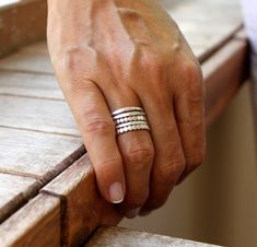 "Modern minimalist and delicate sterling silver stacking ring set. Rings are hammered and textured from 18 gauge (1mm) sterling silver wire. Each ring is unique and has nice organic texture. This listing is for a SET OF 5 individual rings! - 2 rings are made of beaded sterling silver wire and flat hammered. - 1 ring is made of sterling silver wire and hammered. - 2 rings are made of sterling silver wire and textured. You can wear as over the knuckle rings (small sizes). It's perfect for use ever Turquoise Gold Ring, Stackable Ring Sets, Set Rings, Stackable Rings Silver, Silver Opal Ring, Hammered Silver Ring, Silver Rings Simple, Sterling Silver Stacking Rings, Beaded Ring