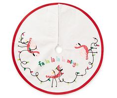 a white bib with flamingos on it and the words happy birthday written in red