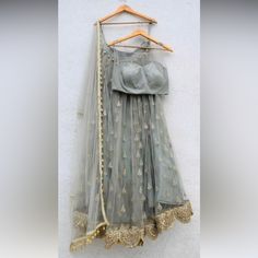 Gorgeous Grey Colored Lehenga With Gold Detaling That Has Never Been Worn. Does Not Fit Anymore Due To Baby Weight. Yellow Gharara, Pakistani Anarkali Suits, Pakistani Anarkali, Grey Lehenga, Green Lehenga Choli, Purple Lehenga, White Lehenga, Lehenga Skirt, Wedding Top