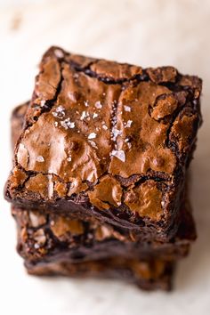 two brownies are stacked on top of each other