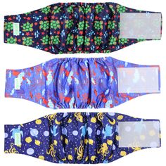 three pieces of cloth with different designs on them, one in blue and the other in purple