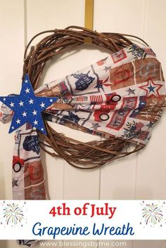 the fourth of july grapevine wreath is hanging on a door