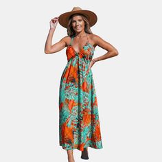 Unleash your vibrant spirit with our Tropical Floral Sleeveless Halter Maxi Dress. The playful tropical florals dance across the fabric, creating a lively and eye-catching ensemble. With a chic halter neckline and a flowing maxi length, this dress is a perfect balance of style and comfort. Product code: CAA05A4A038SJ/CAA05A4C090RK Green Summer Dress With Plant Print, Green Floral Print Vacation Dress, Green Floral Print Dress For Vacation, Summer Tropical Printed Maxi Dress, Tropical Floral Print Vacation Dresses, Tropical Sundress For Vacation, Tropical Printed Maxi Dress For Summer, Printed Tropical Maxi Dress For Summer, Vibrant Green Floral Print Maxi Dress